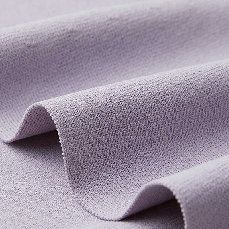 ML2242 Gebreide jurk met verlengde polohals, enkele knop en korte mouwen aan de zijkant ML2242 Gebreide jurk met verlengde polohals, enkele knop en korte mouwen aan de zijkant